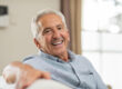 Portrait,Of,Happy,Senior,Man,Smiling,At,Home.,Old,Man